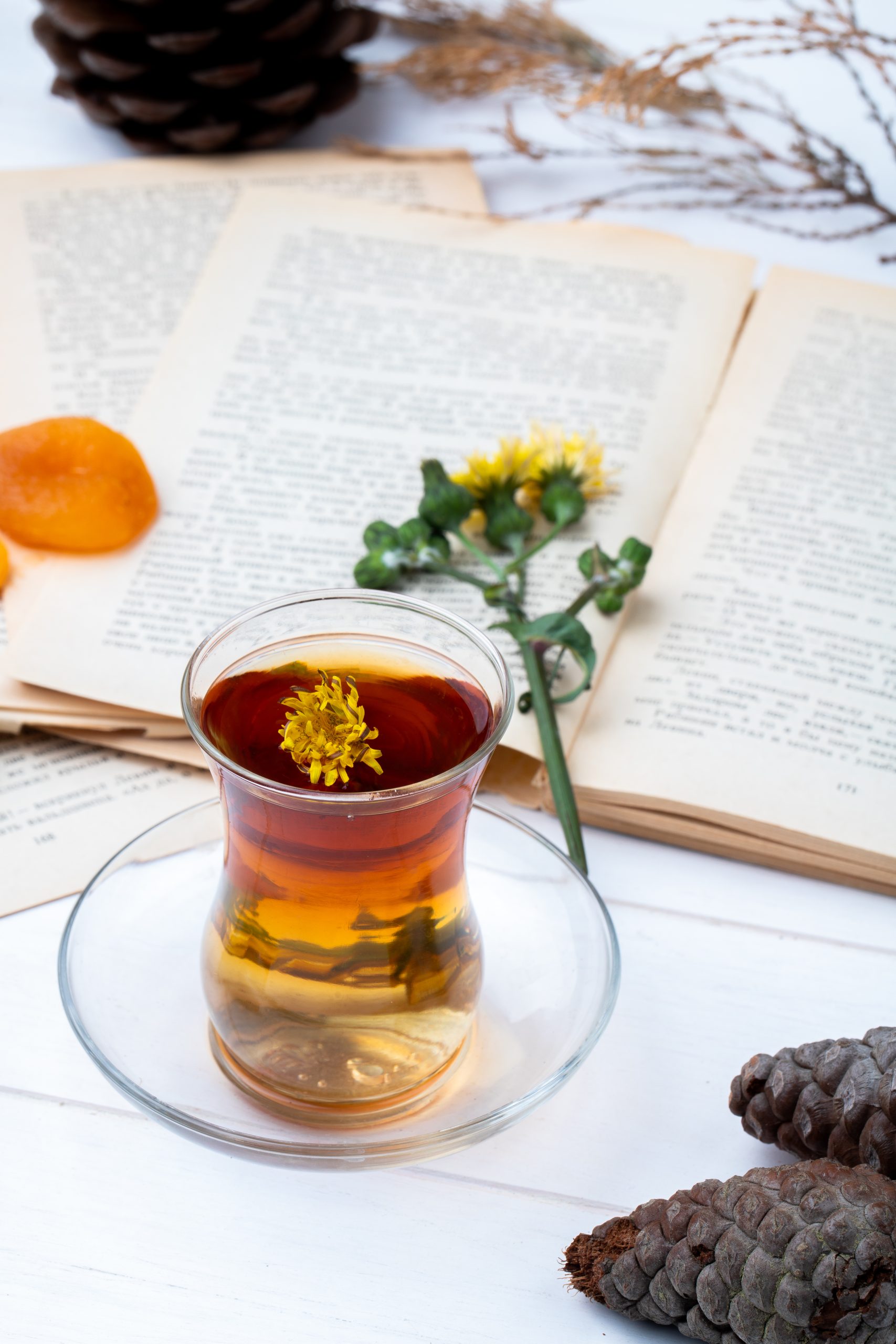 Clear glass of dandelion tea