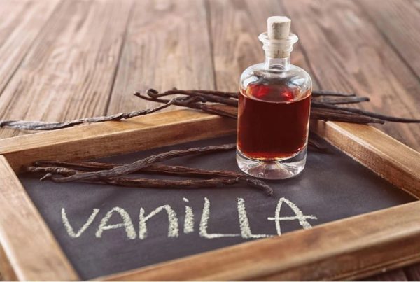 Bottle of vanilla and vanilla beans