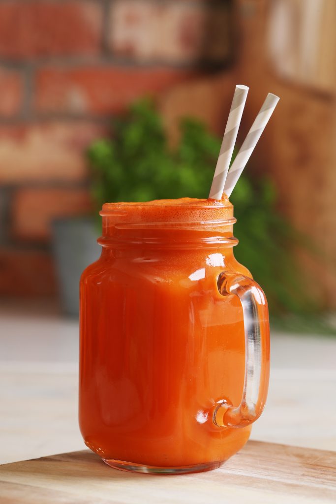 Orange smoothie in a mason jar