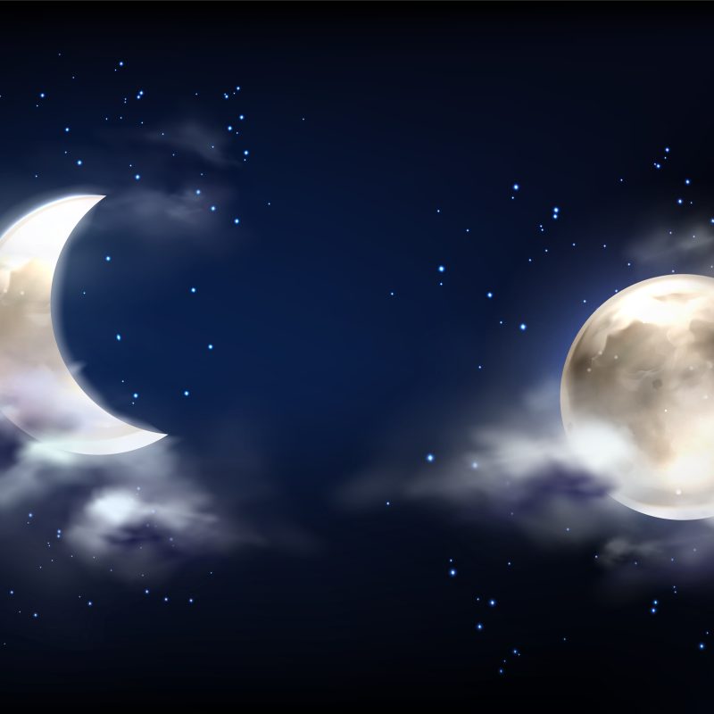 Moon in night sky with clouds and stars.
