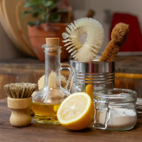 arrangement with lemons cleaning items