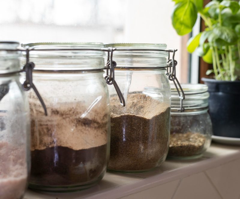 Ground coffee and spices in glass jars