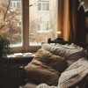 Cozy nook by a window and a candle