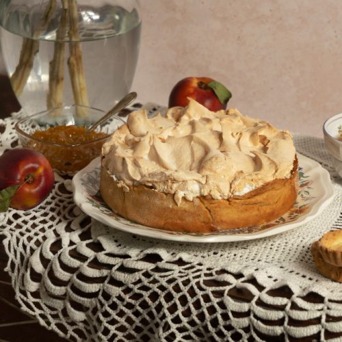 Pie with whip cream on a side table