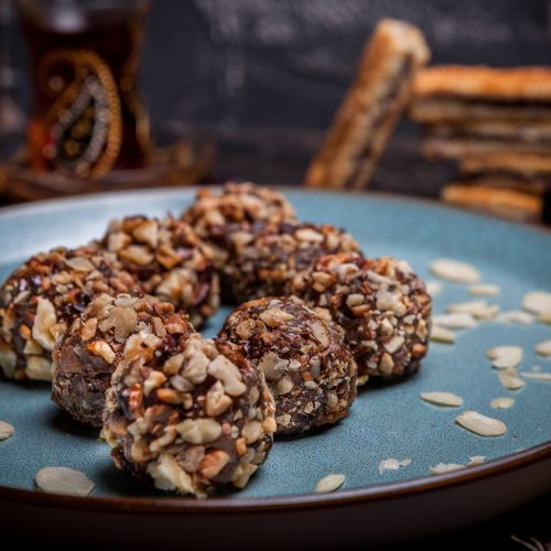 Side view of protein power balls with nuts