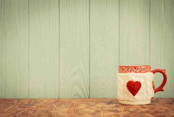 Cup with a mug warmer on it