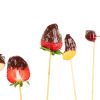 Fruit on a skewer with chocolate