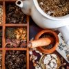 Herbs and spices ina divider box on a table
