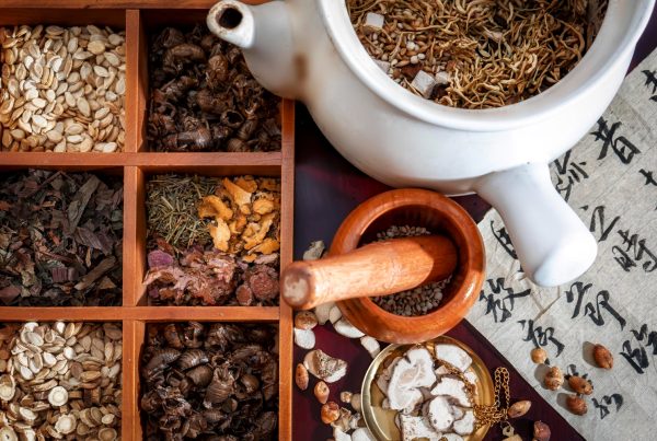 Herbs and spices ina divider box on a table