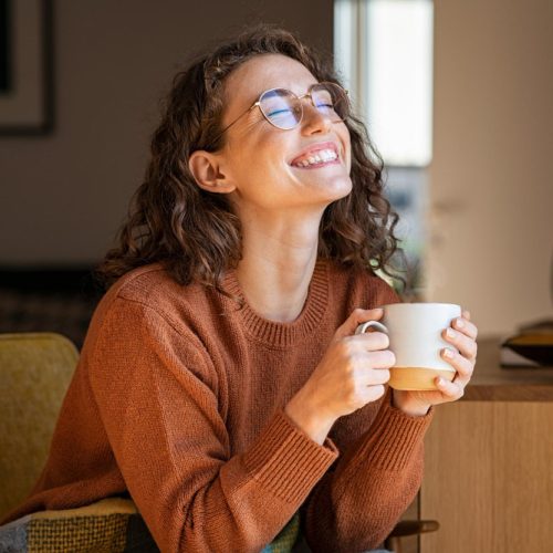 Woman enjoying a hot drink in the morning