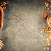 Top view of bowls of granola and honey