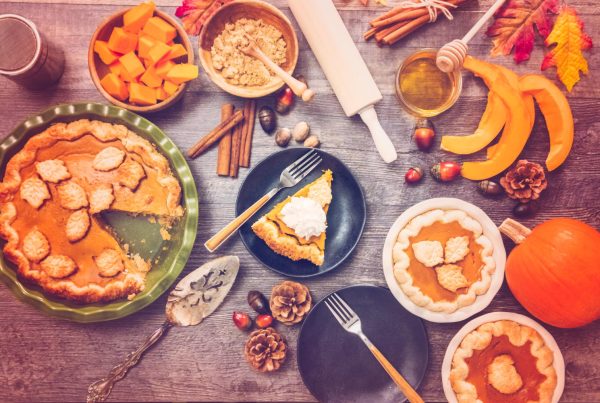 Counter with baking supplies and pies