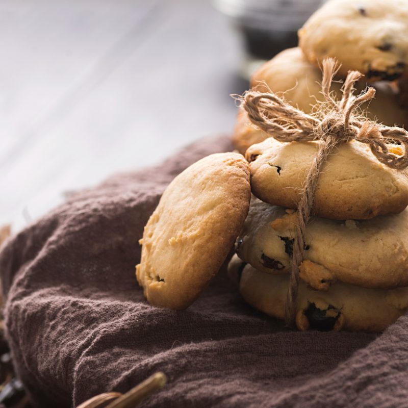 chocolate cookies in a stack with gift string