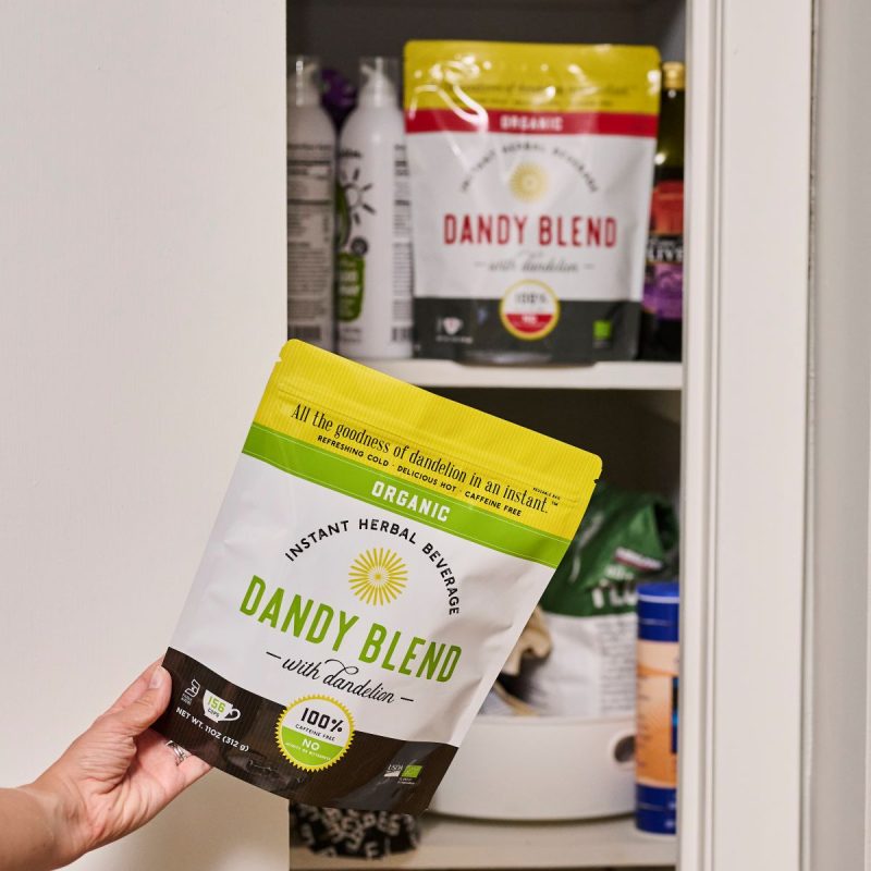 Organic green bag replacing a red bag in a cupboard